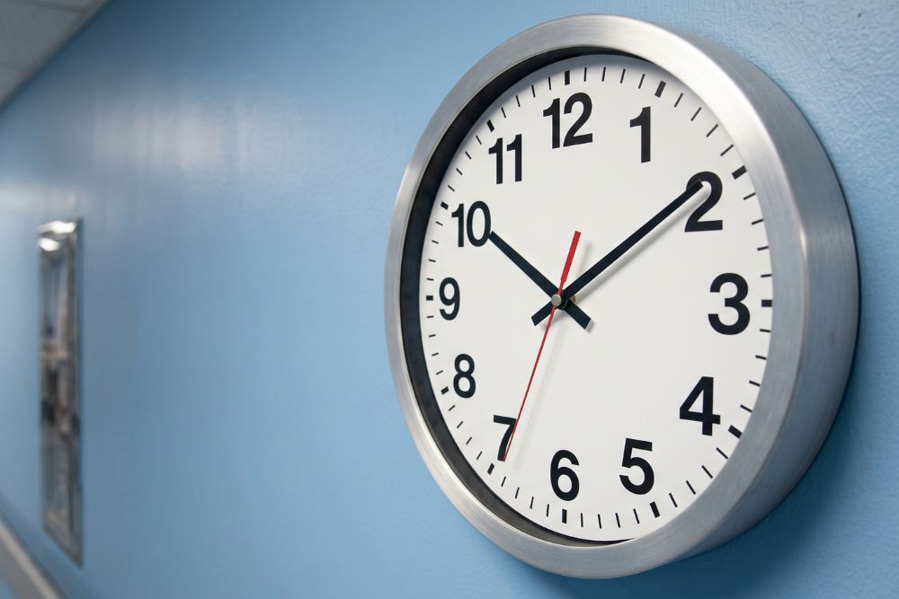 a clock on a hospital wall